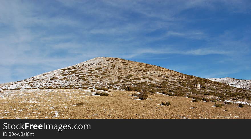 Winter scenery with distant ridge