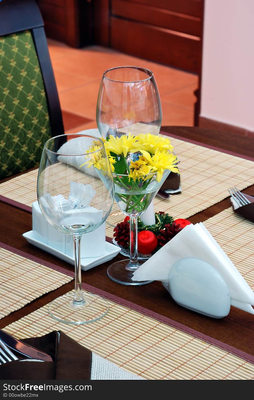 Wine glasses on a restaurant table.