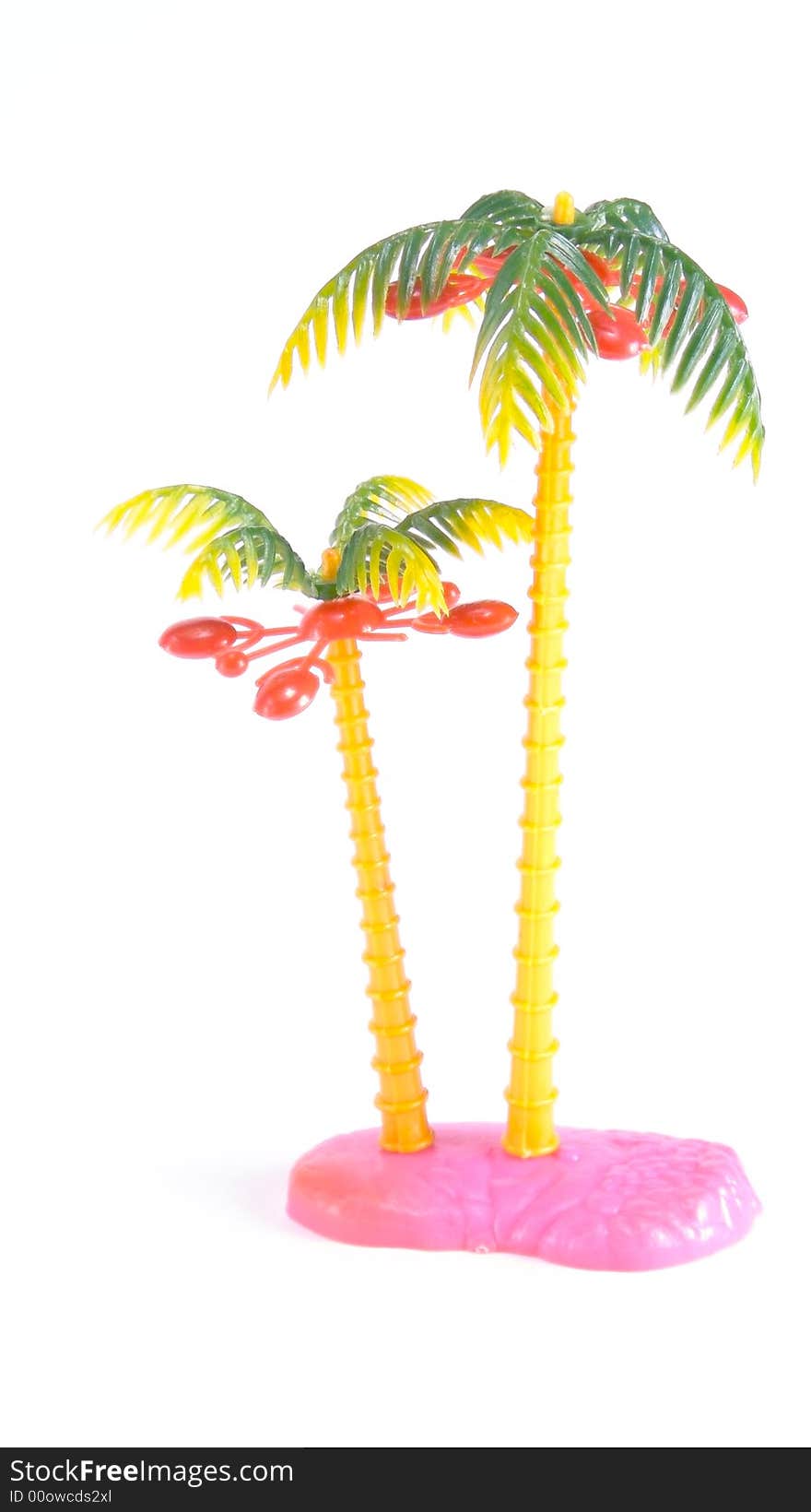 Toy island. Tropical atoll. Palme. Coconuts. Isolated on a white background.