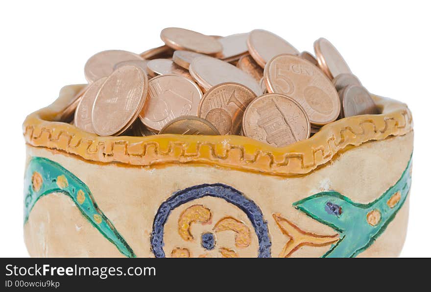 Clay bowl with coins