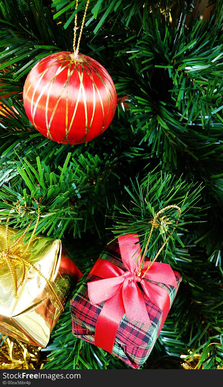 Close-up of Christmas decorations on a tree. Close-up of Christmas decorations on a tree.