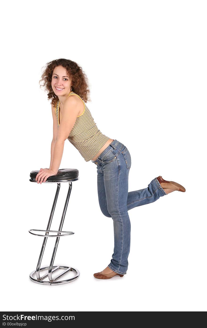 Young woman and bar stool isolated on white