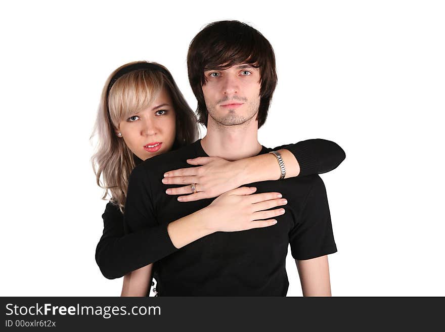 Girl embraces fellow on white