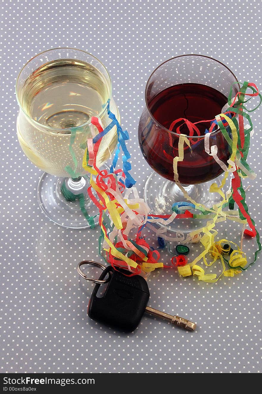 Two glasses of wine and some car keys