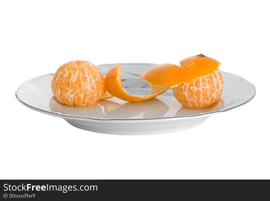 Two connected peeled tangerines on plate isolated on white