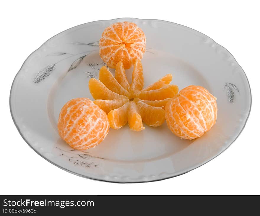 Peeled tangerines on plate isolated on white