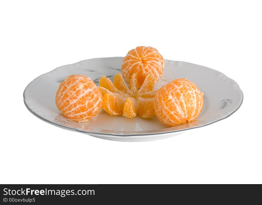 Peeled tangerines on plate isolated on white