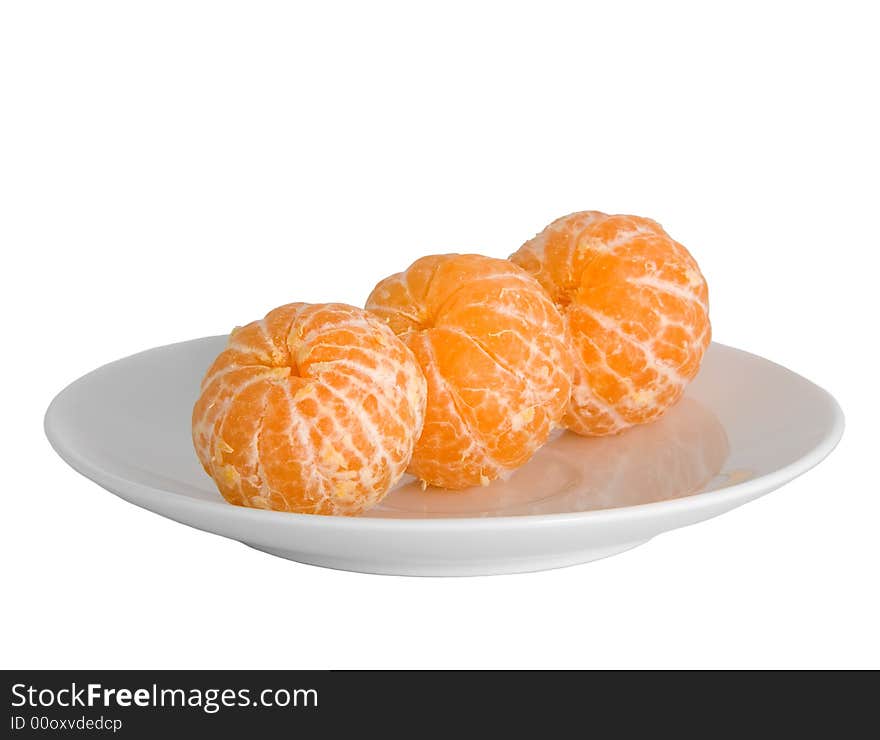 Peeled tangerines on plate isolated on white