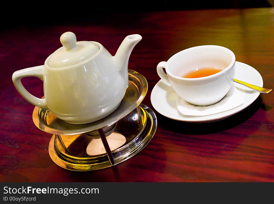 Teapot and cup of tea