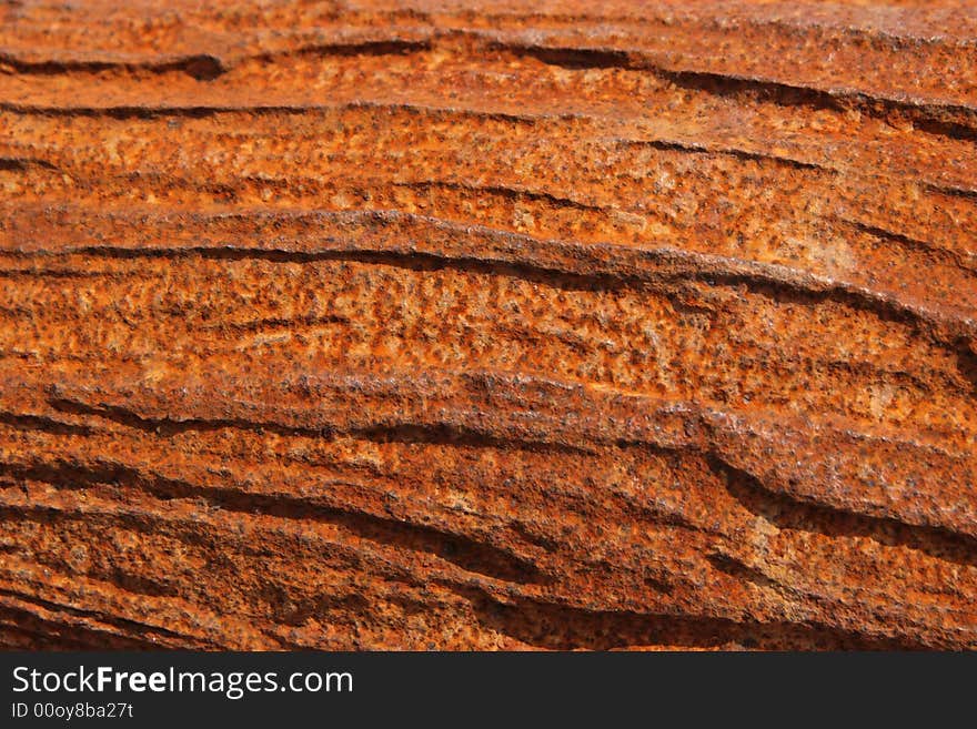 A rusty gullied plaque to be used as backgrounf or texture