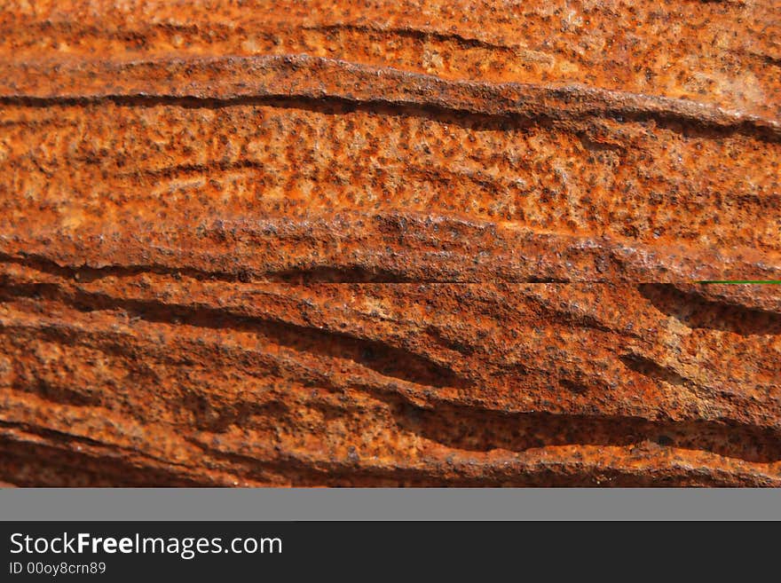 A rusty gullied plaque to be used as backgrounf or texture