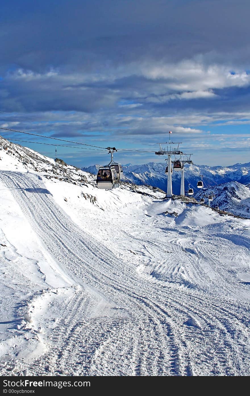 Gondola lift under clouds