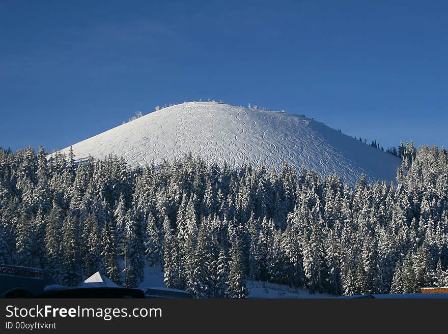 A freshly tracked ski mountain