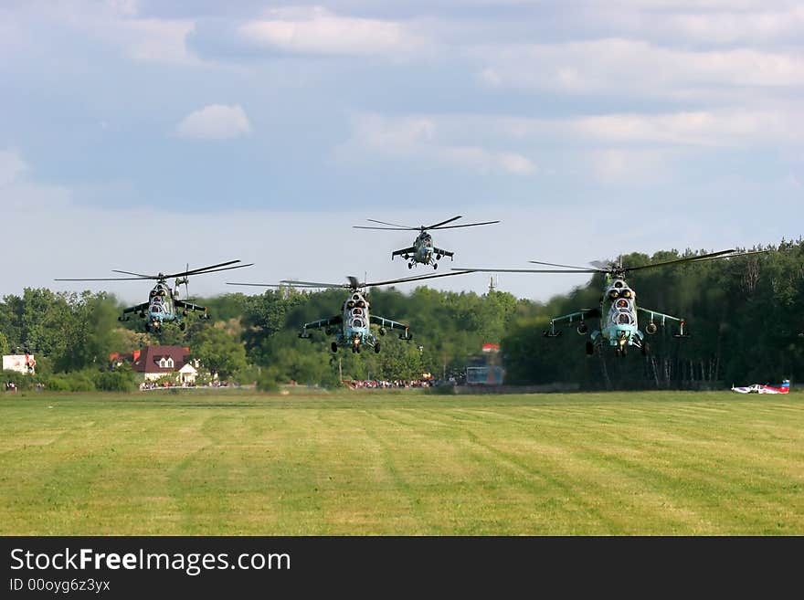 Five military helicopters flying during air show. Five military helicopters flying during air show