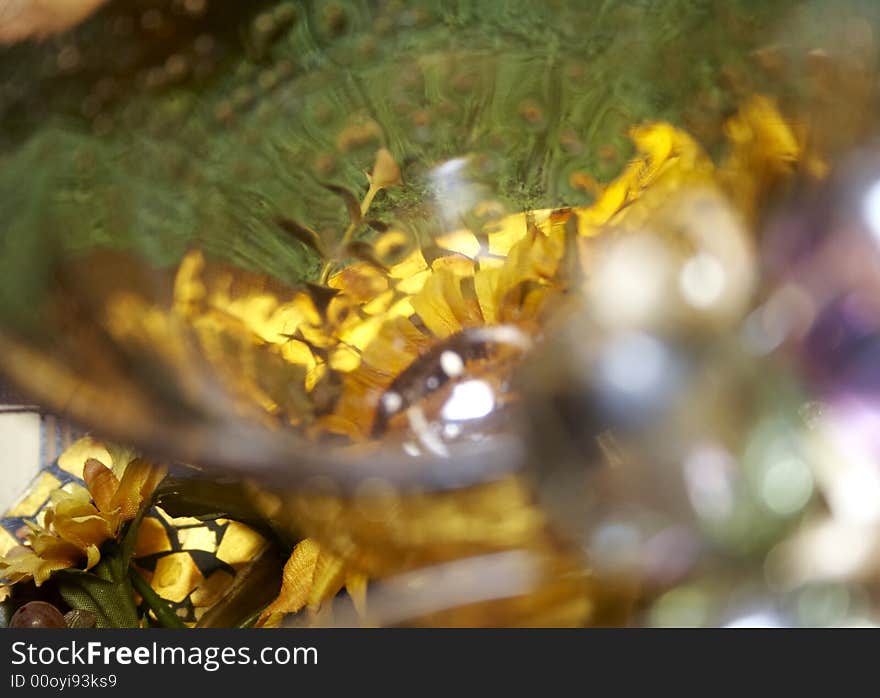 Close-up of yellow wineglass