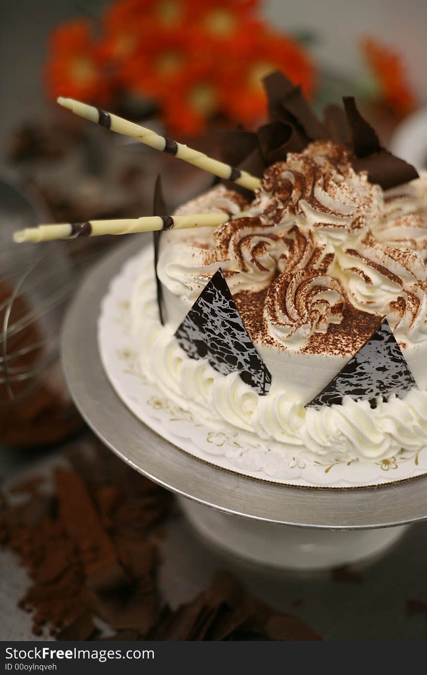 A Birthday Cake being decorated at the bakery. A Birthday Cake being decorated at the bakery