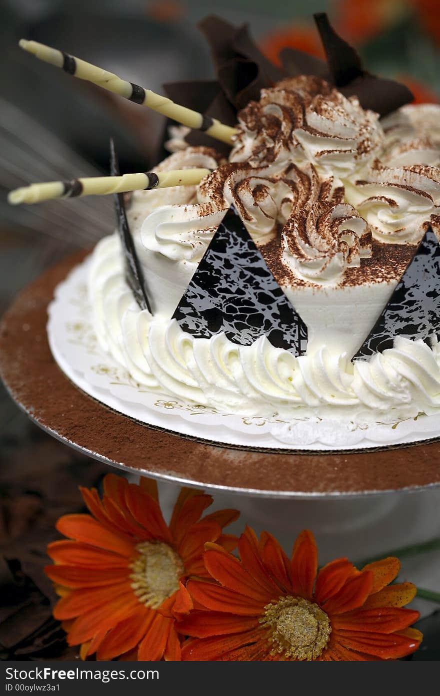 A Birthday Cake being decorated at the bakery. A Birthday Cake being decorated at the bakery