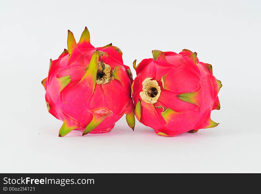 Red dragon fruits isolated on white background