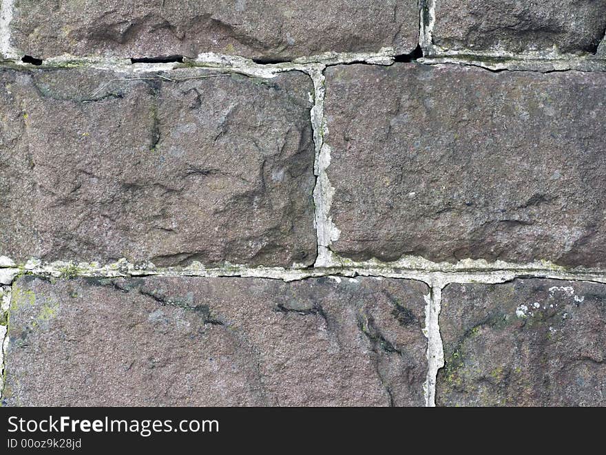 Old stone wall textured background. Old stone wall textured background