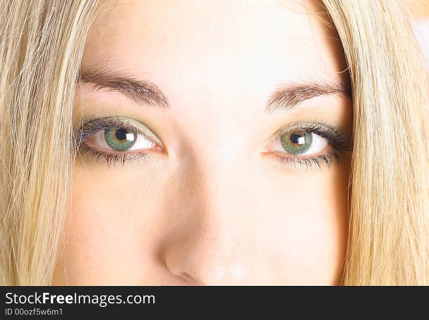 Shot of a womans green eyes