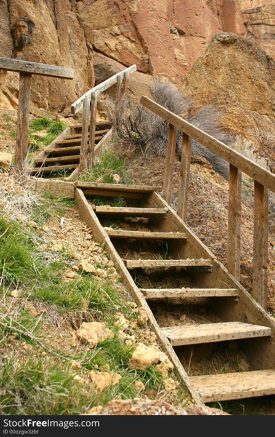 Two sets of stairs against a cliff. Two sets of stairs against a cliff