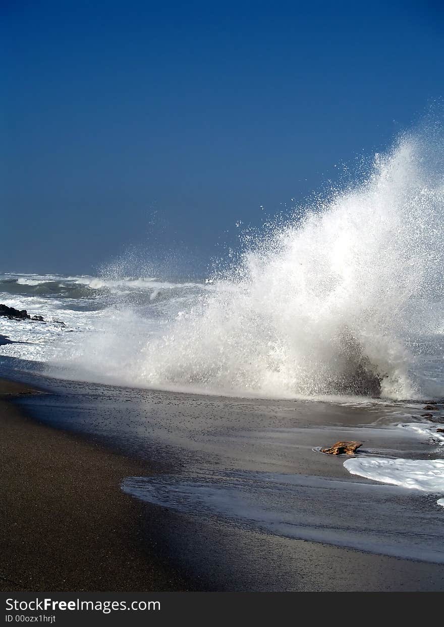 Waves crashing into a limestone shelf at high tide in florida. Waves crashing into a limestone shelf at high tide in florida