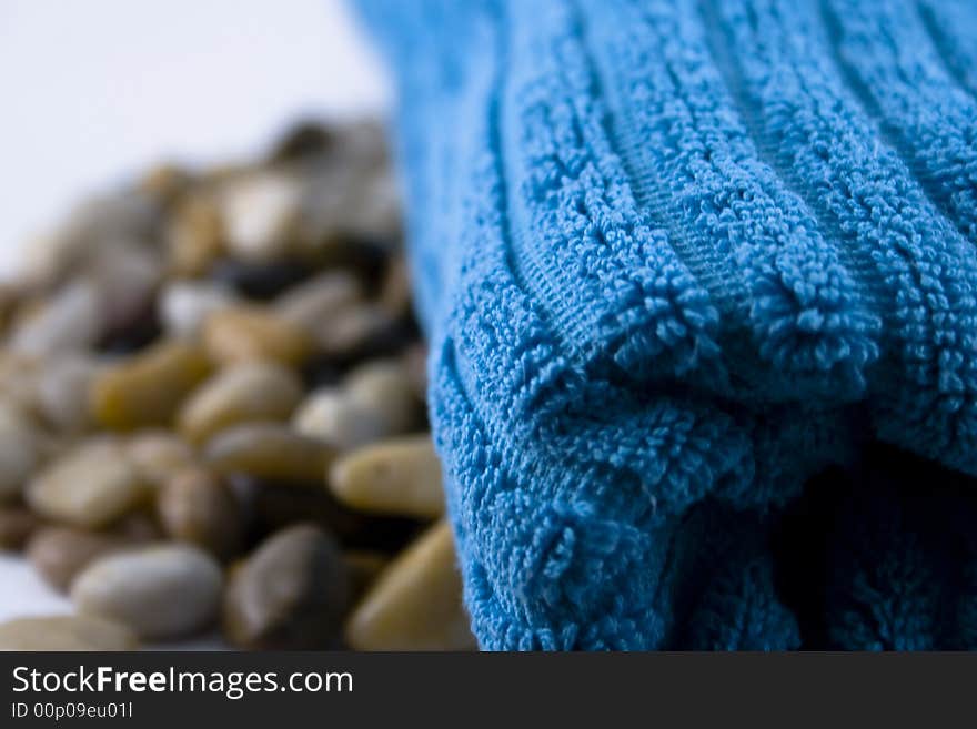 Blue towel and stones