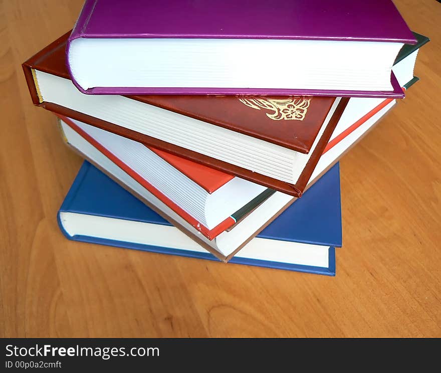 Heap of books on table