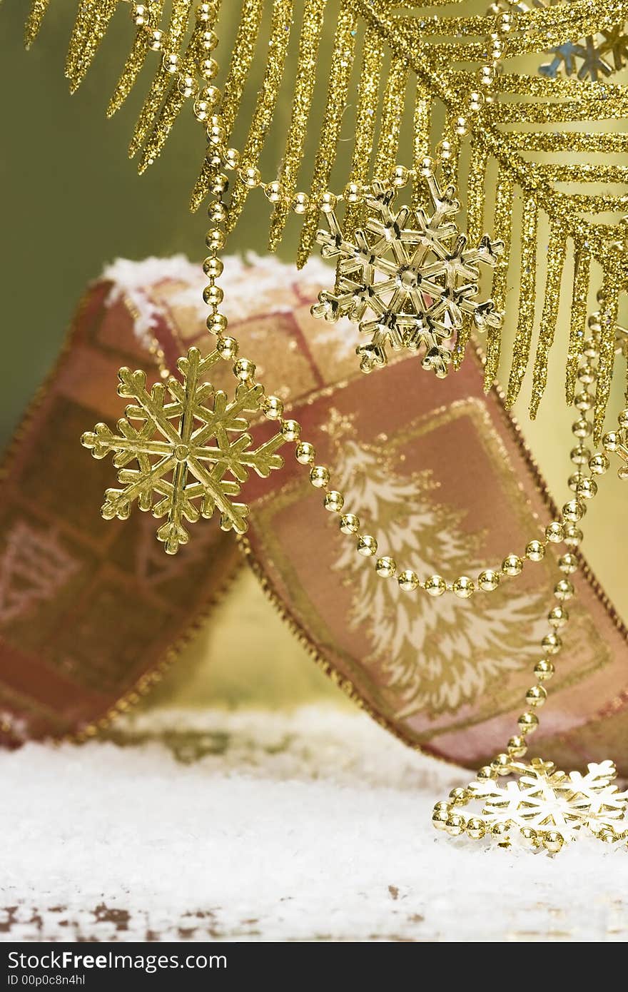 Golden snowflakes on Christmas tree