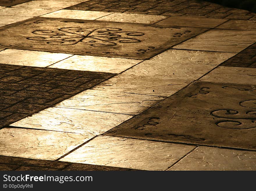 Tiled Pavement Background at sunset