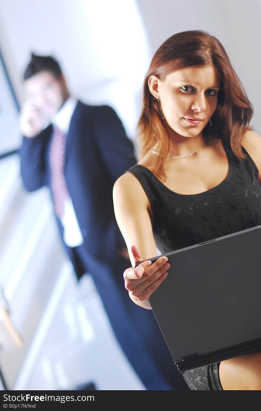 Attractive businesswoman with a notebook