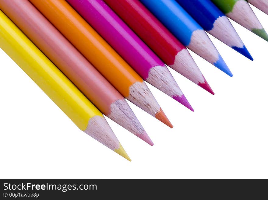 Rainbow of colored pencils aligned in a row. Rainbow of colored pencils aligned in a row