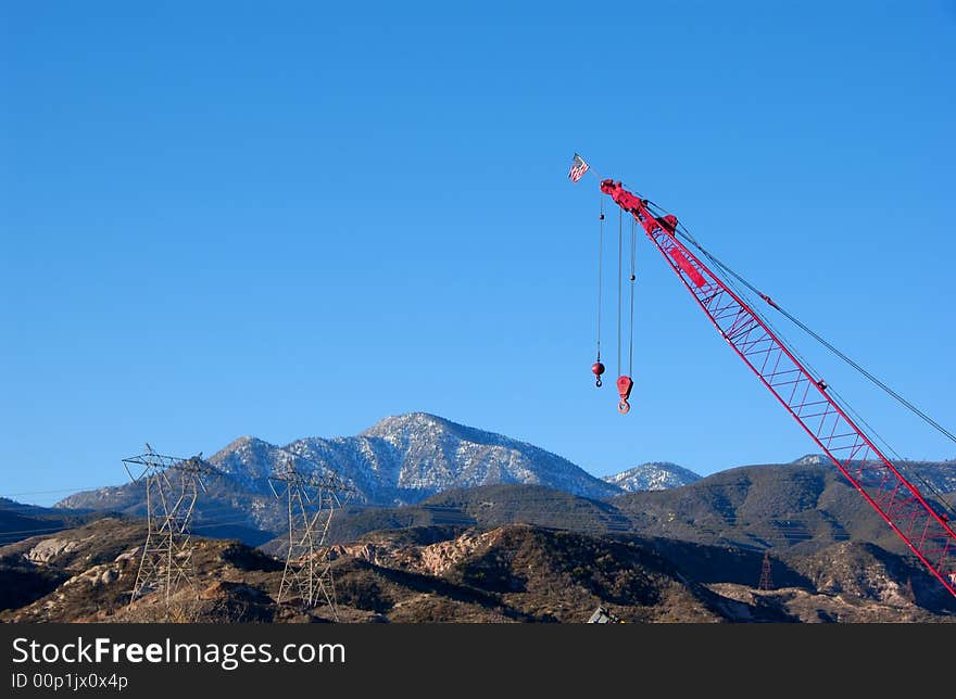 A big red cranes and flag