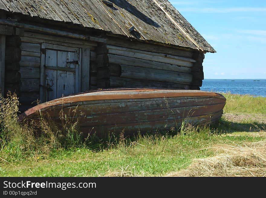 Old fishing boat near the shed