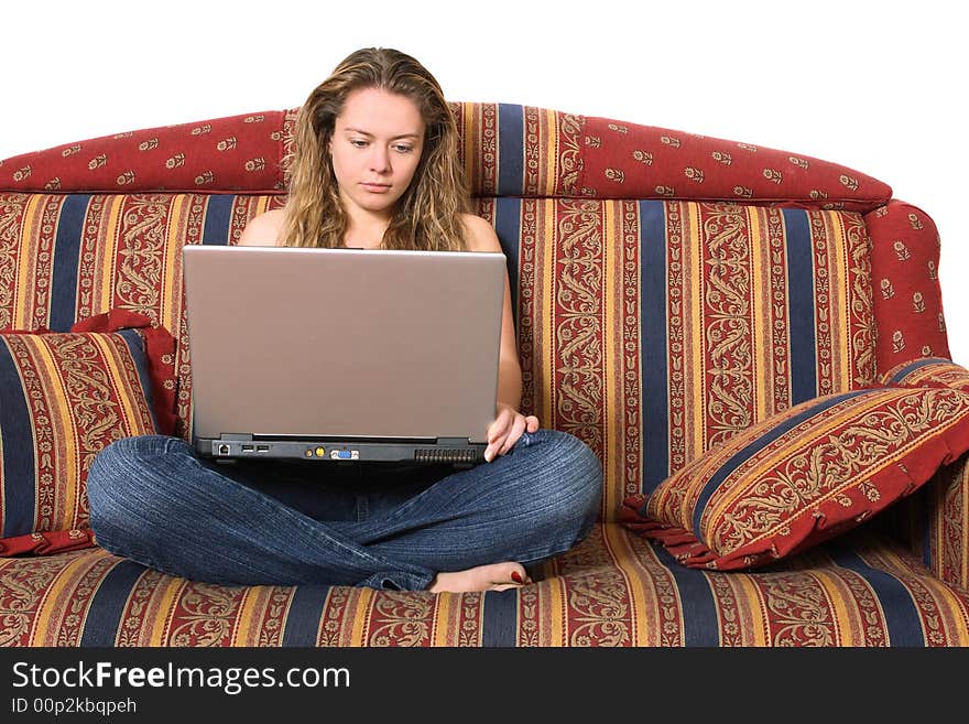 Girl with laptop on  sofa