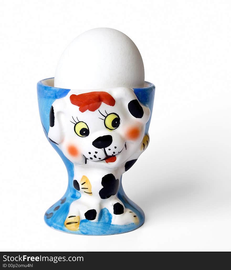 Blue porcelain eggcup with egg