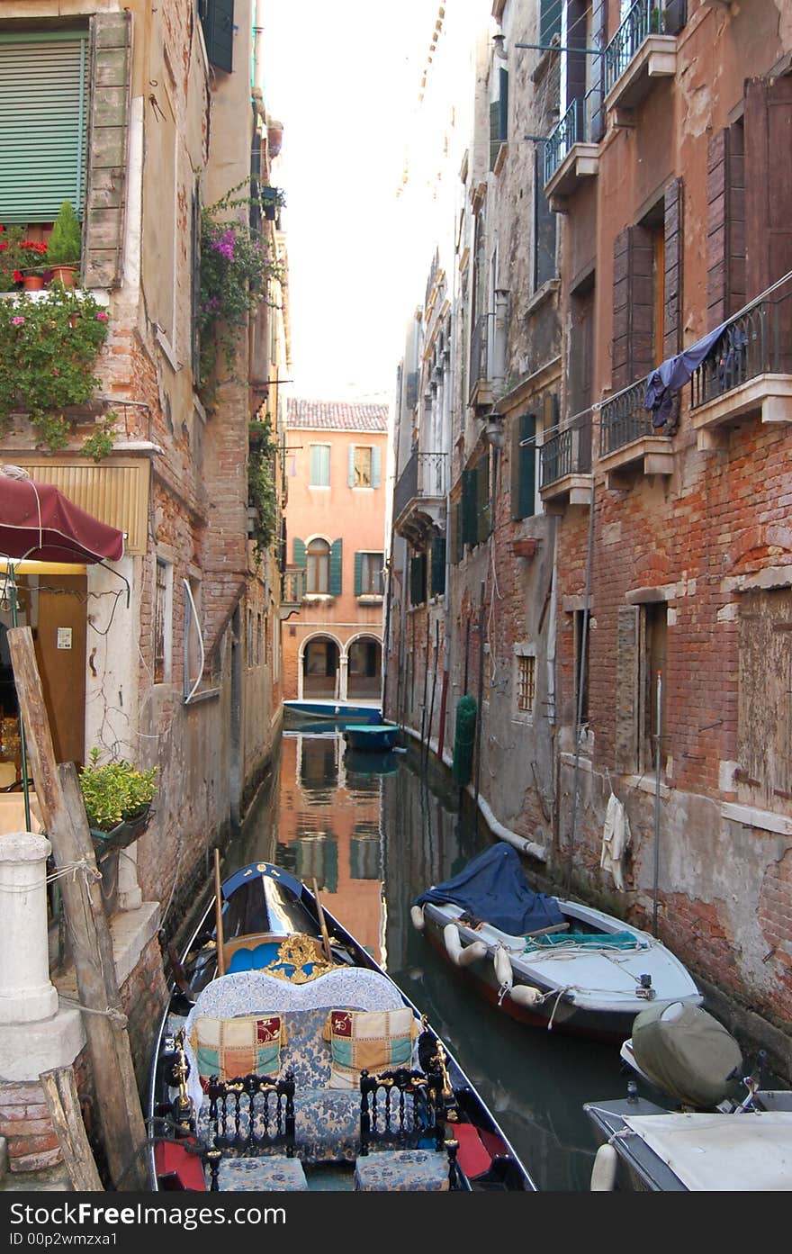 This photo was taken in Venice of some gondolas on the canal. This photo was taken in Venice of some gondolas on the canal