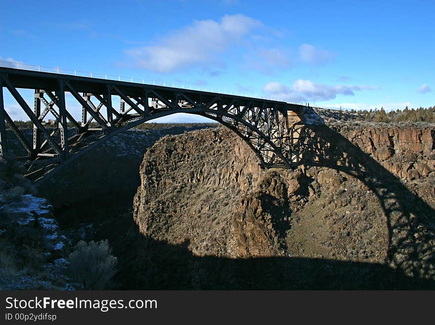 A railroad bridge across a deep canyon in oregon