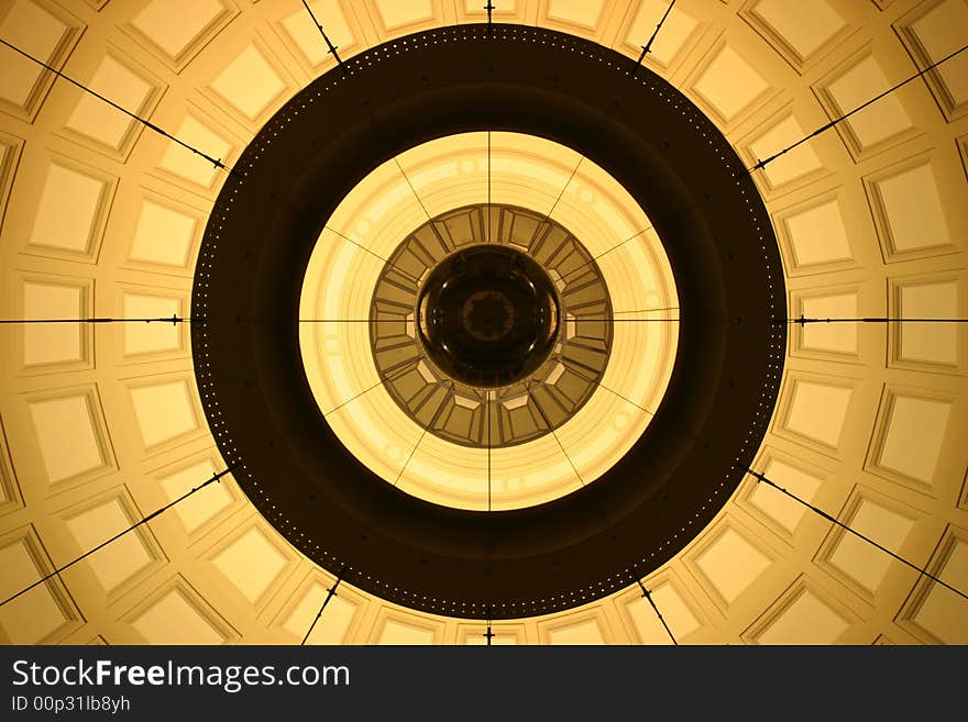 This is a lightsource in the middle dome of the hall in one of Barcelona's big train stations during the night. It was totally empty at that time, so I could take this photo, putting the camera on the floor and trying hard to get it all symmetrical. This is a lightsource in the middle dome of the hall in one of Barcelona's big train stations during the night. It was totally empty at that time, so I could take this photo, putting the camera on the floor and trying hard to get it all symmetrical.