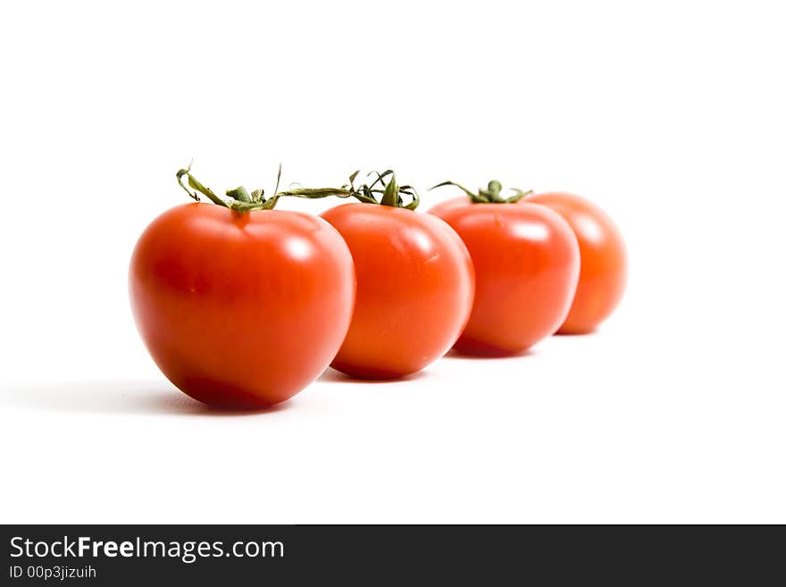 Tomatoes on isolated white background