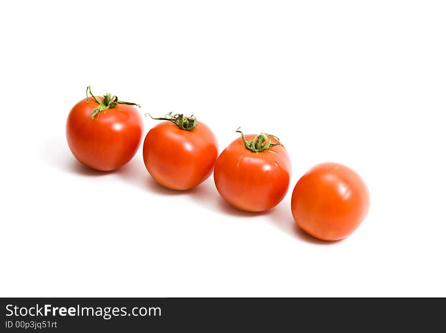 Tomatoes on isolated white background