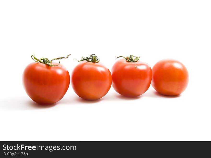 Tomatoes on isolated white background