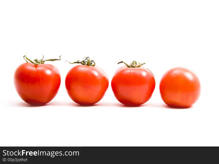 Tomatoes on isolated white background