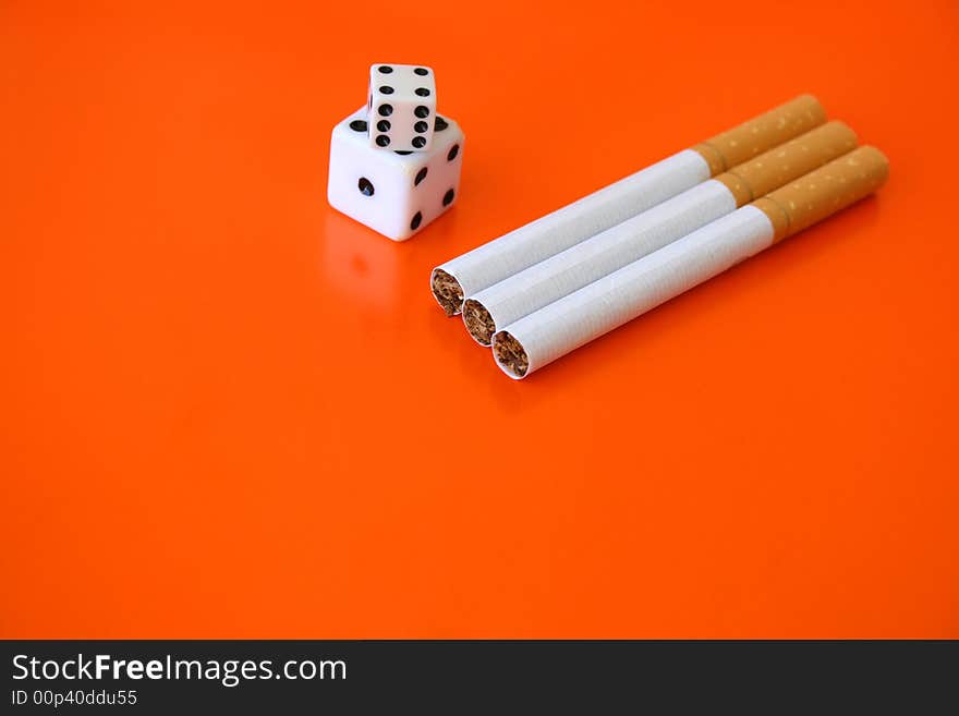 Cigarettes and dice, a gamble with your life. Cigarettes and dice, a gamble with your life