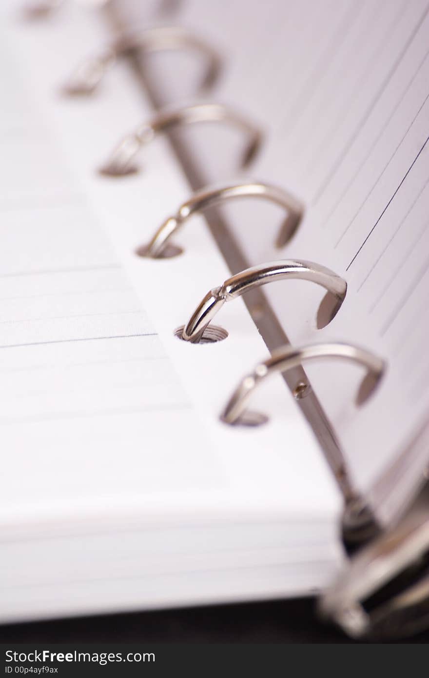 Notebooks closeup with white lined paper