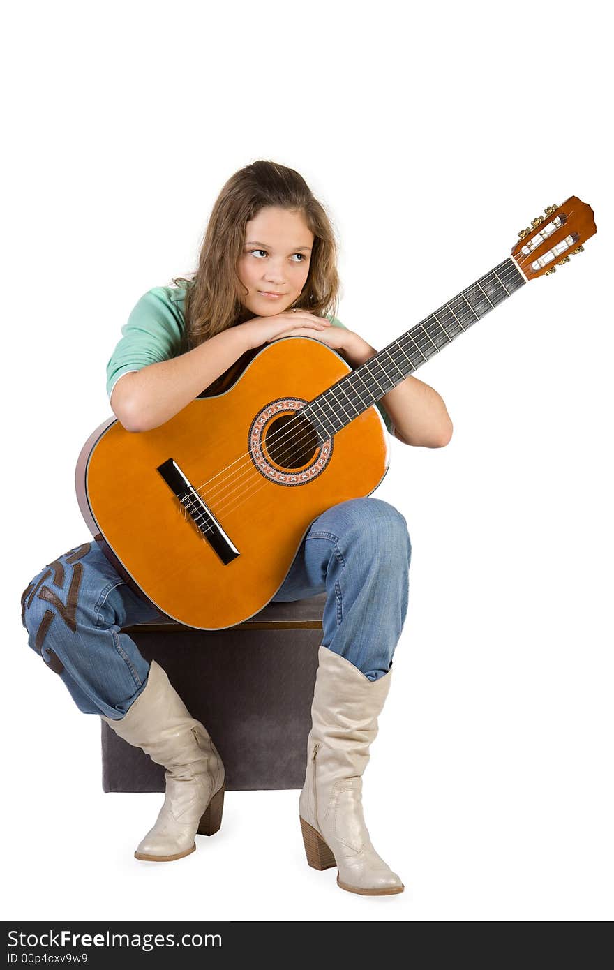 Young girl with guitar. Isolate on white.