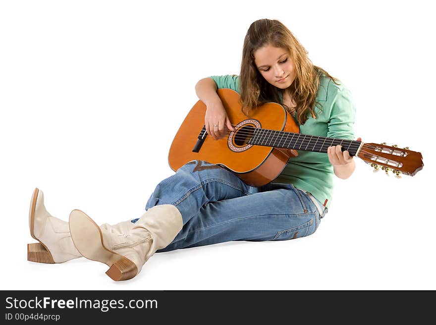 Young girl with guitar. Isolate on white.