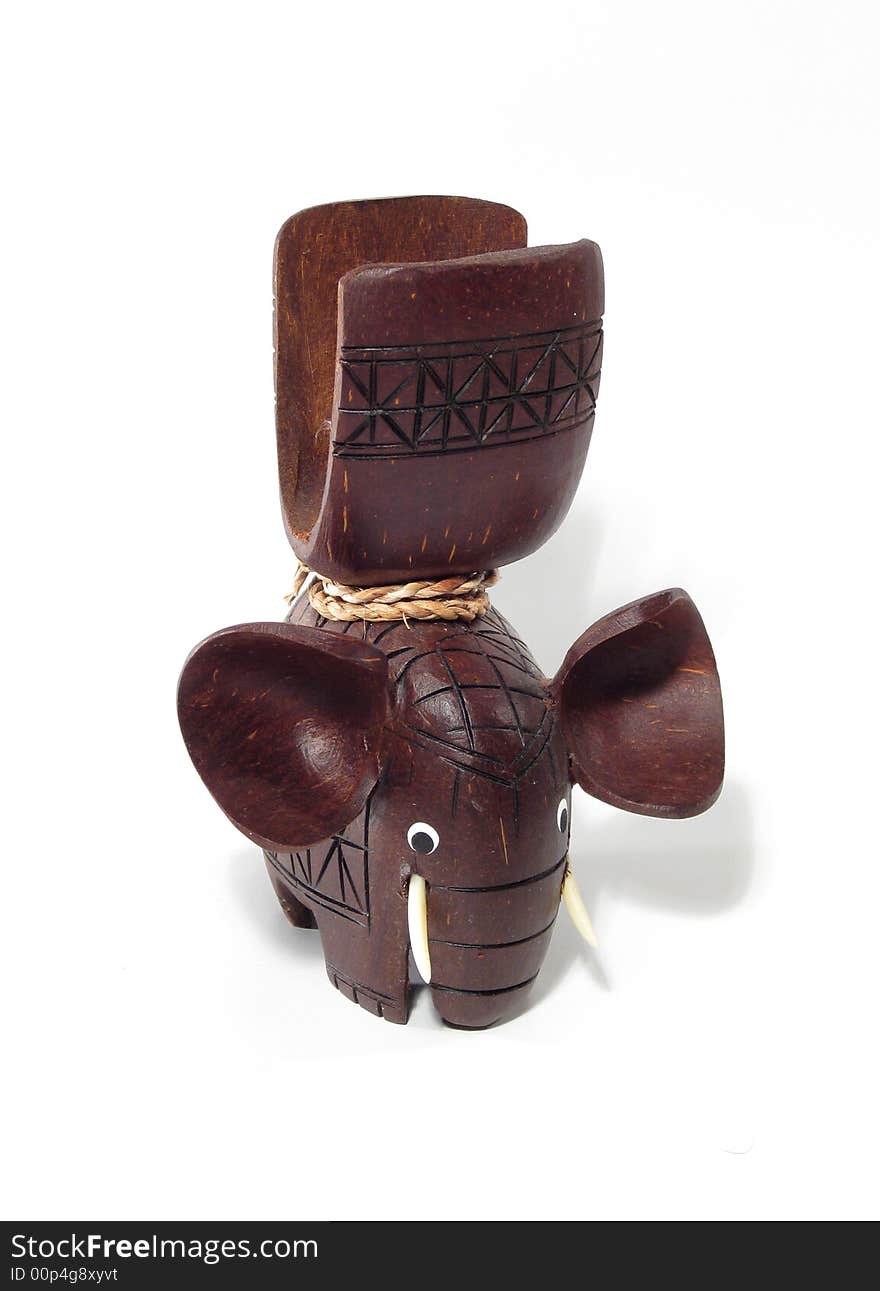 Brown wooden elephant on white background