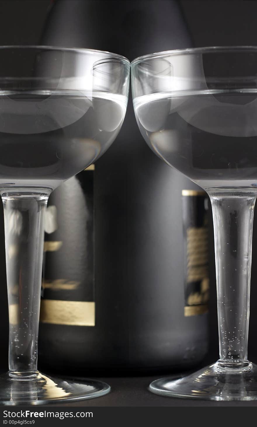 Image from christmas series: bottle and goblets on champagne