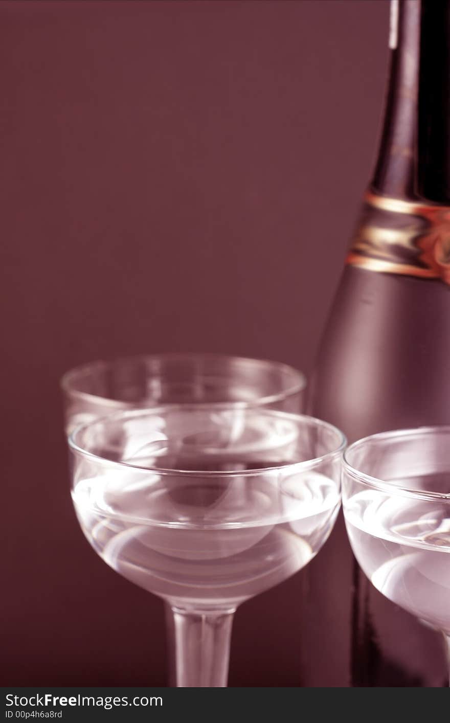 Image from christmas series: bottle and goblets on champagne